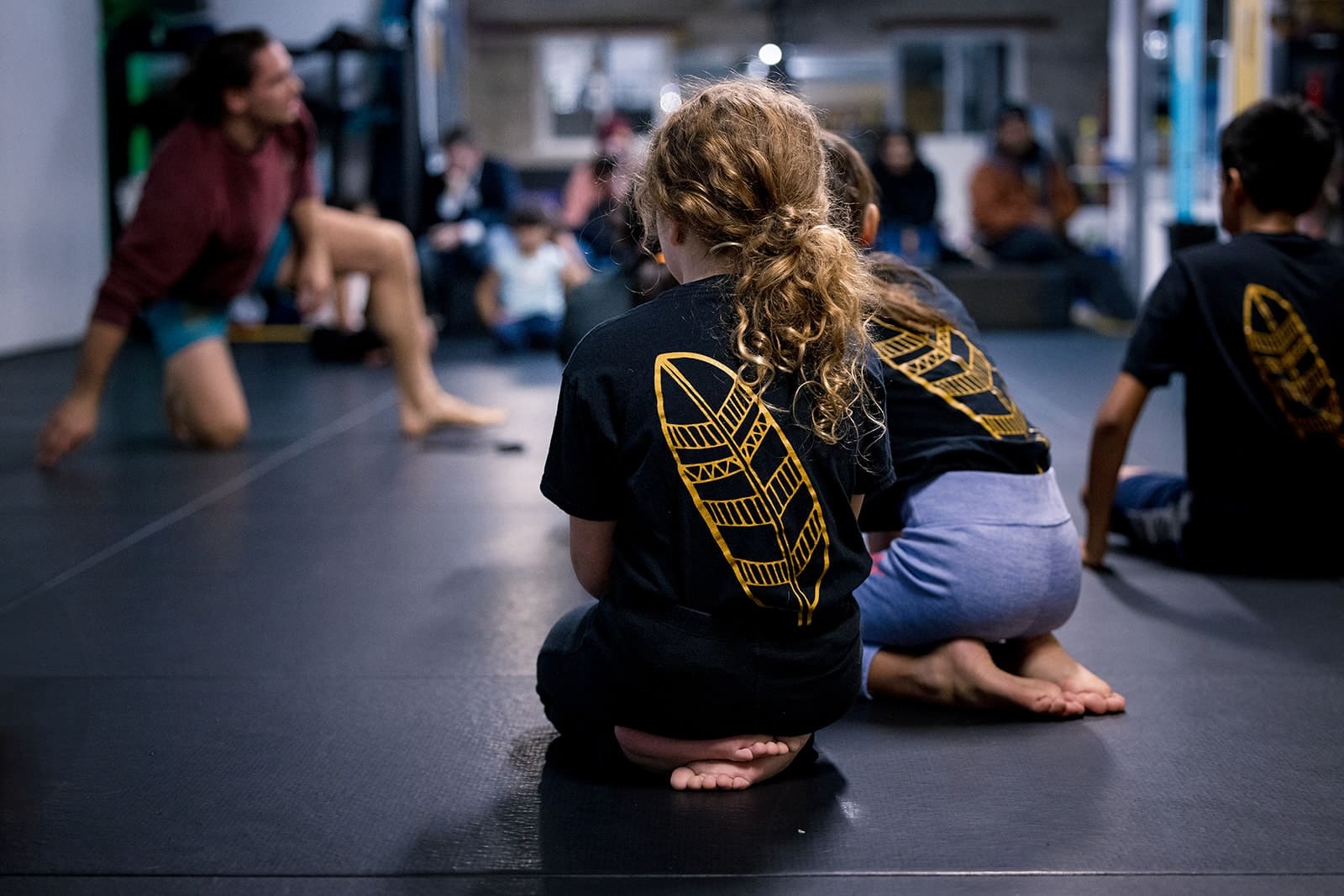 Freestyle Dojo bjj students sitting in martial arts class in Toronto
