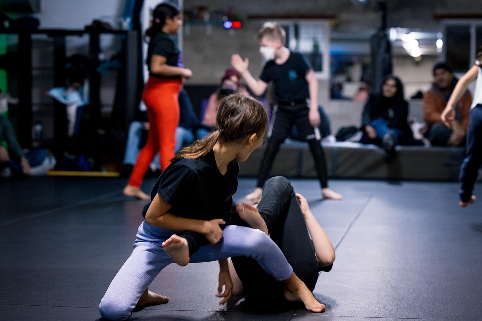 Jiu-Jitsu students sparring in bjj class at Freestyle Dojo in Toronto